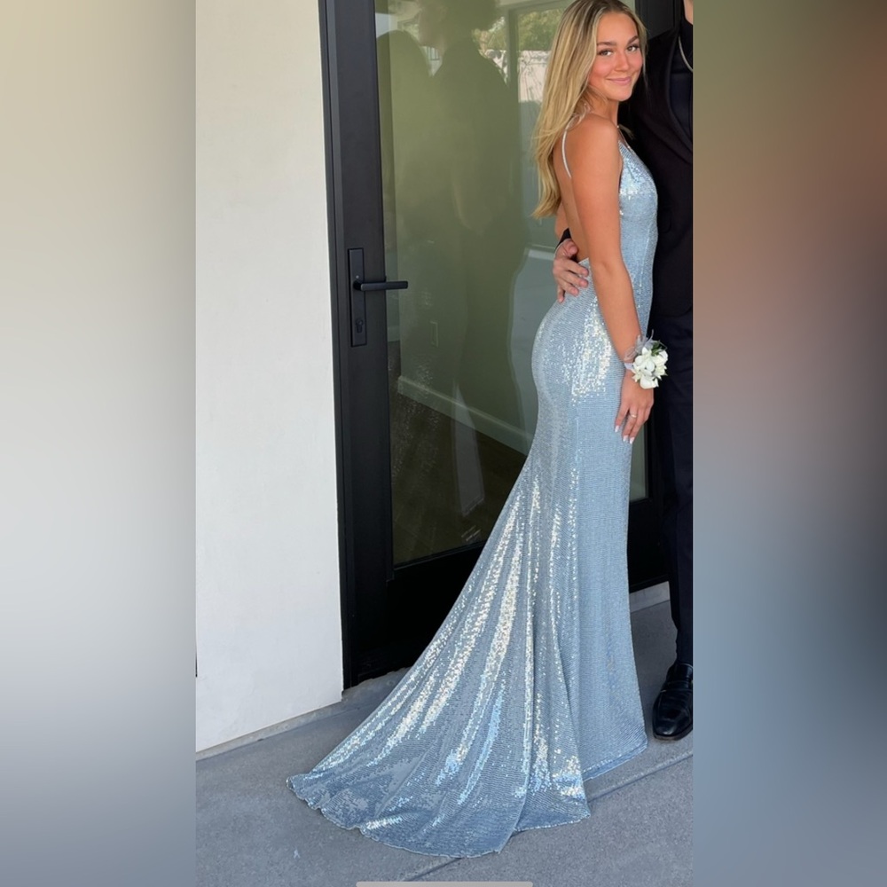 Jovani light blue backless dress with embellishments.